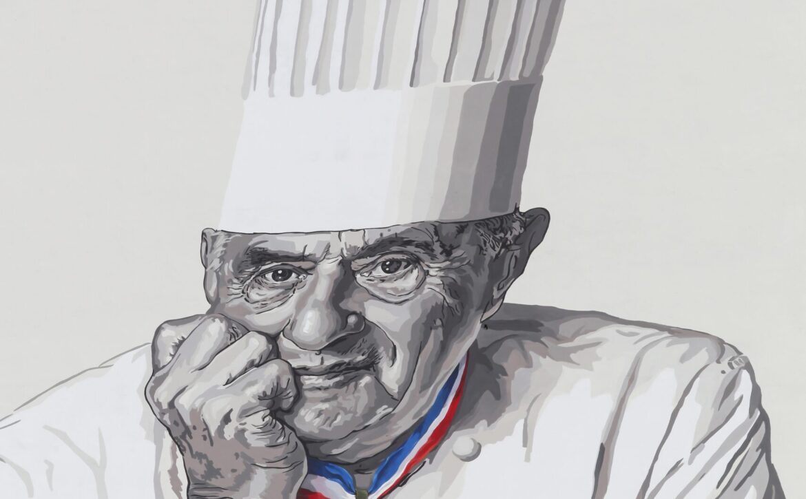 Lyon, France – March 26, 2016: Facade in Lyon with Paul Bocuse portrait. Paul Bocuse, 3 stars at the Michelin guide, is a french chef based in Lyon who is famous for the high quality of his restaurant